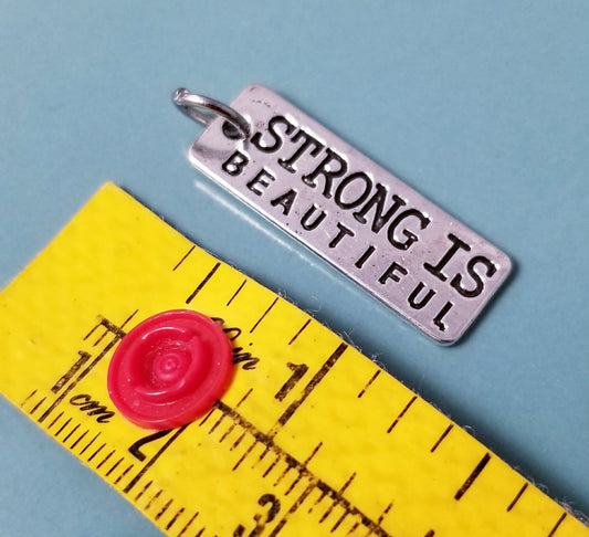 Strong is Beautiful Charm – Silver Empowerment Jewelry