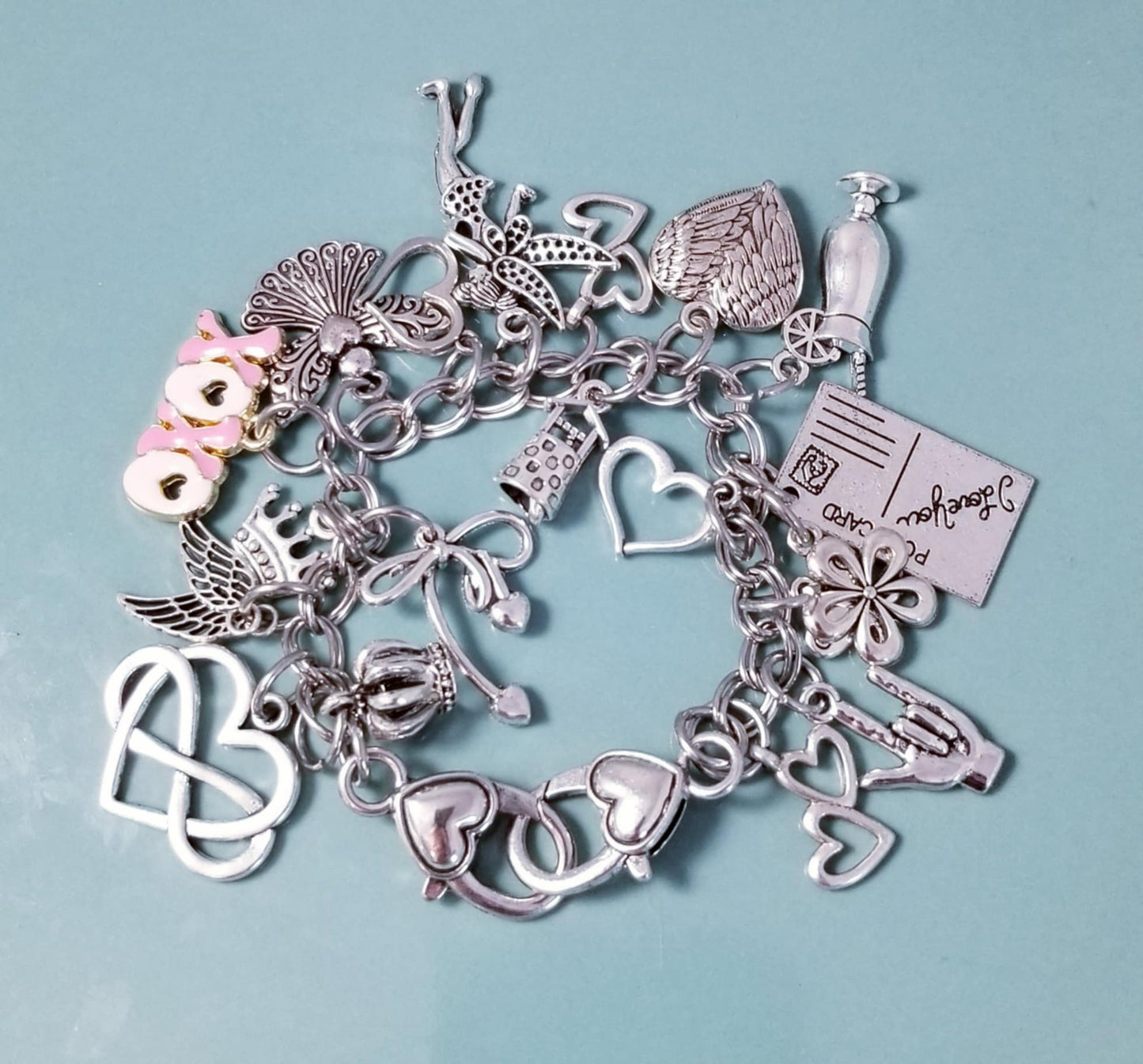 7 1/4-inch Pink XOXO Charm Bracelet with Heart Clasp – Whimsical Loaded Charm Collection