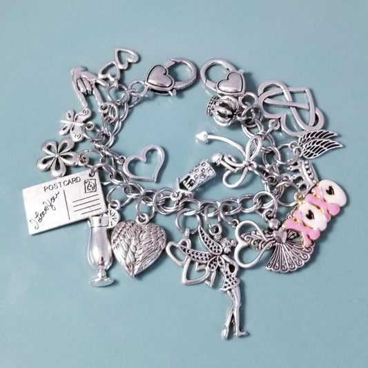 7 1/4-inch Pink XOXO Charm Bracelet with Heart Clasp – Whimsical Loaded Charm Collection