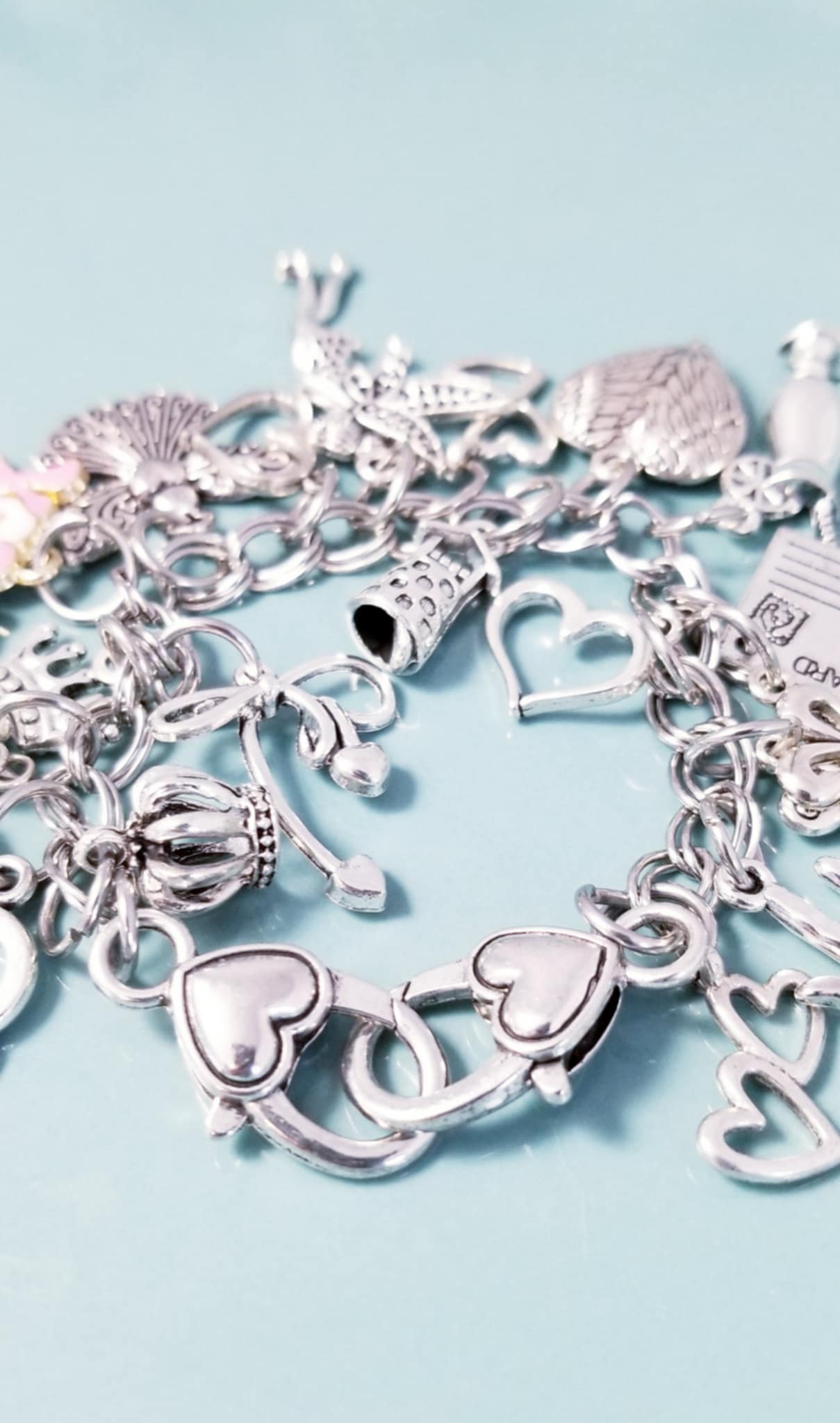 7 1/4-inch Pink XOXO Charm Bracelet with Heart Clasp – Whimsical Loaded Charm Collection