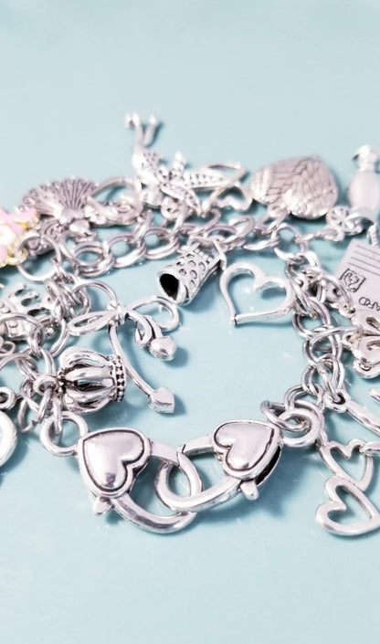 7 1/4-inch Pink XOXO Charm Bracelet with Heart Clasp – Whimsical Loaded Charm Collection