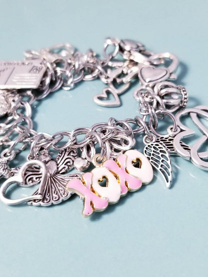 7 1/4-inch Pink XOXO Charm Bracelet with Heart Clasp – Whimsical Loaded Charm Collection